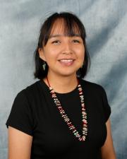 Headshot of Delilah Begay in a black top.